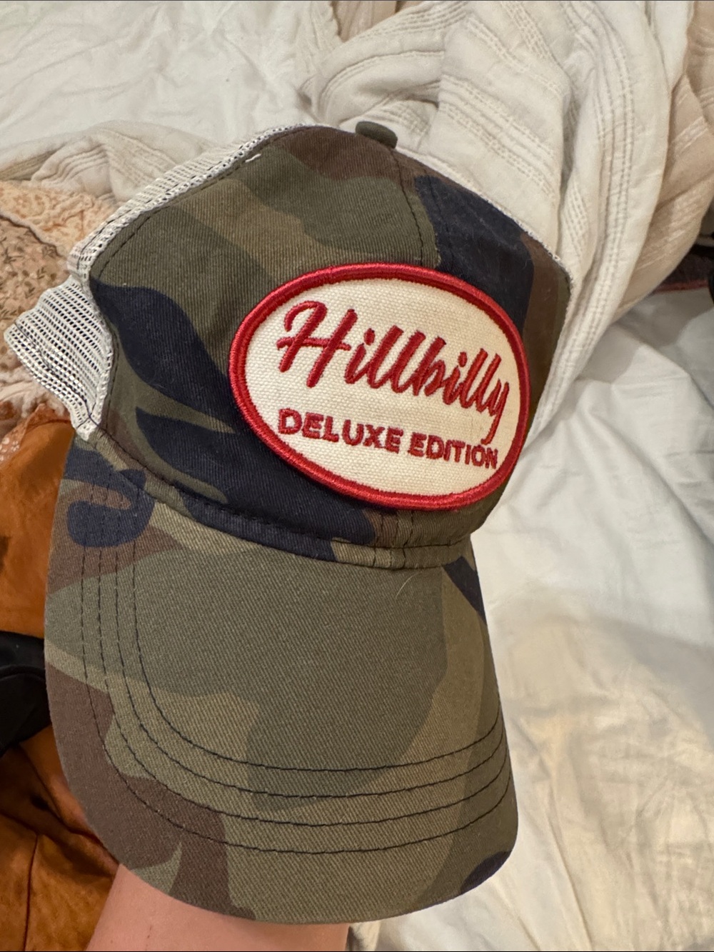 Idyllwind Hillbilly Deluxe Edition Camo Trucker Hat with Red Patch